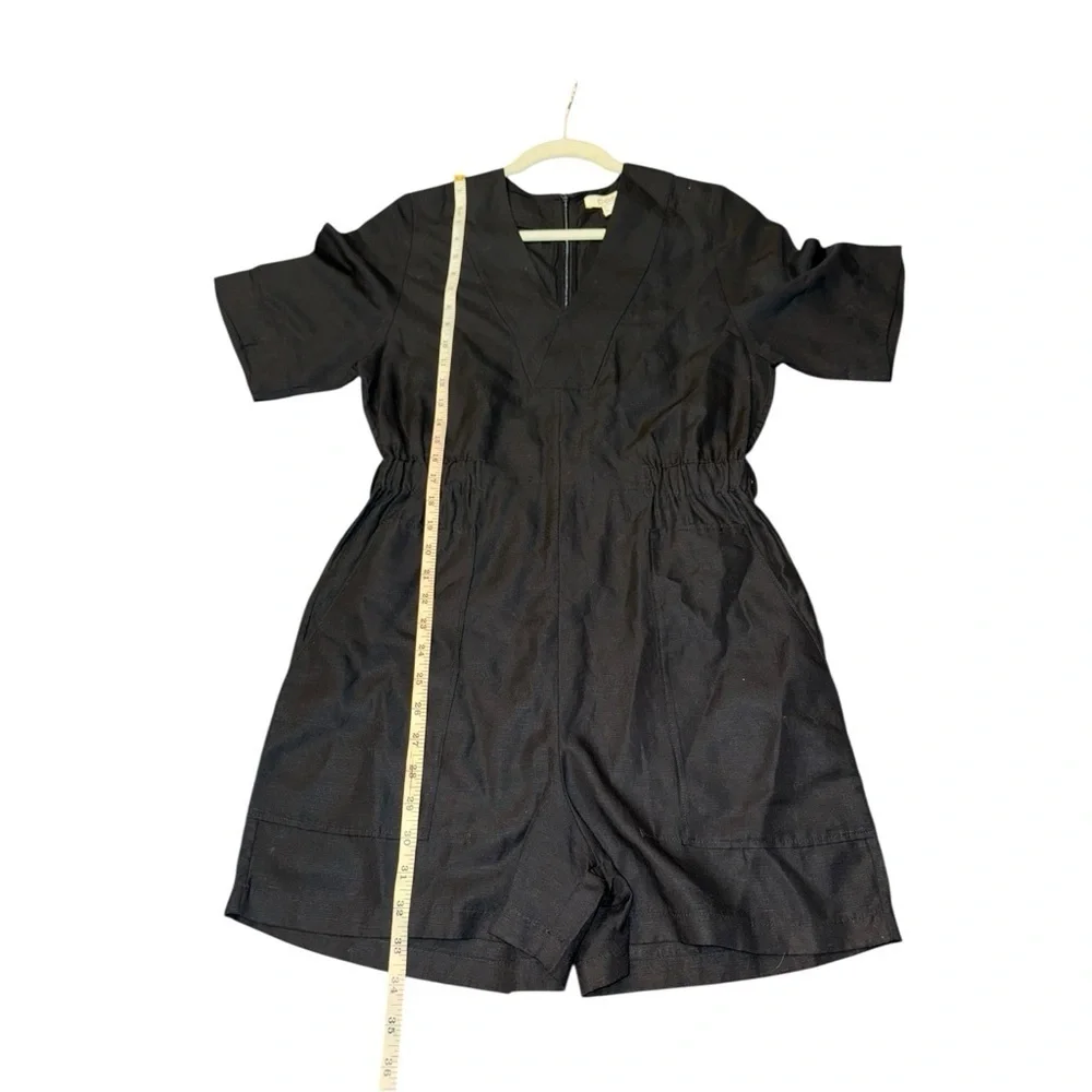 COS v neck belted playsuit 73% TENCEL Lyocell, 22% Linen, 5% Cotton.